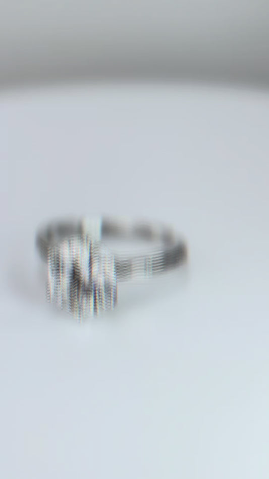 Round cut moissanite engagement ring